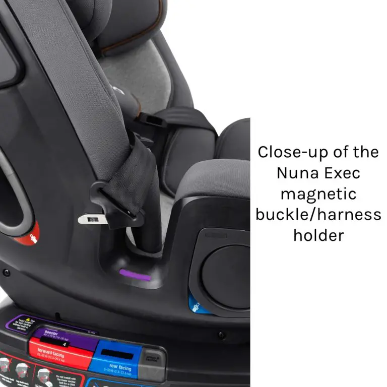 Close-up of Nuna Exec carseat magnetic buckle harness holder